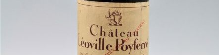 La photo montre une bouteille du grand vin du chateau leoville poyferre à saint julien à Bordeaux