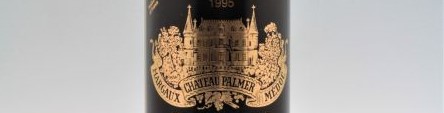 The picture shows a grand cru bottle of Chateau Palmer wine from Bordeaux