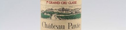 The picture shows a grand cru bottle of Chateau Pavie wine from Bordeaux