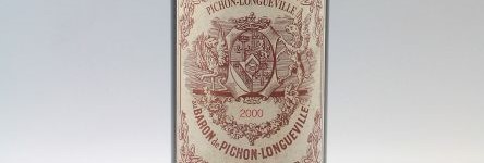 The picture shows a grand cru bottle of Chateau Pichon Longueville Baron wine from Bordeaux