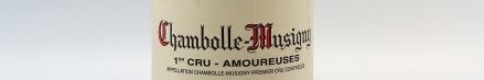 La photo montre une bouteille de vin de Chambolle Musigny, Bourgogne