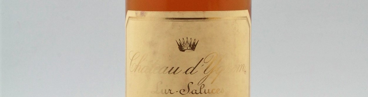 The picture shows a grand cru bottle of Chateau Yquem wine from Bordeaux